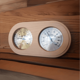 Oval Aspen Encased Thermometer/Hygrometer C-F (10″ x 5 1/2″) - The Sauna Place